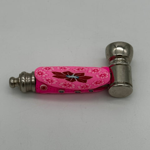 Pink Clay and Metal Pipe